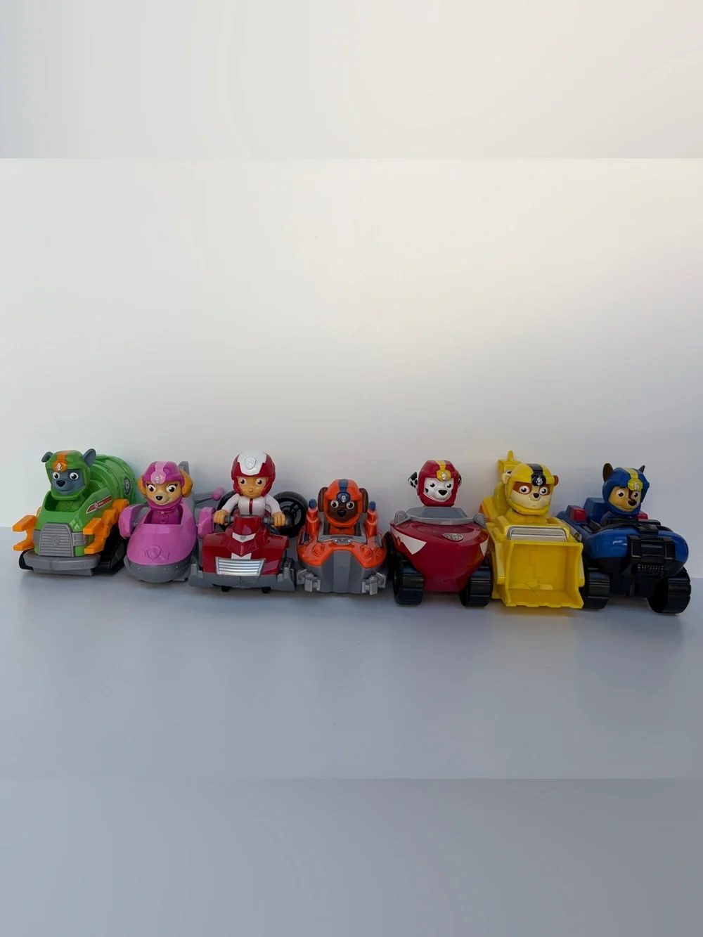 Paw Patrol Racers Lot of 7 Plastic Character Vehicles - Ryder and Pups Hover